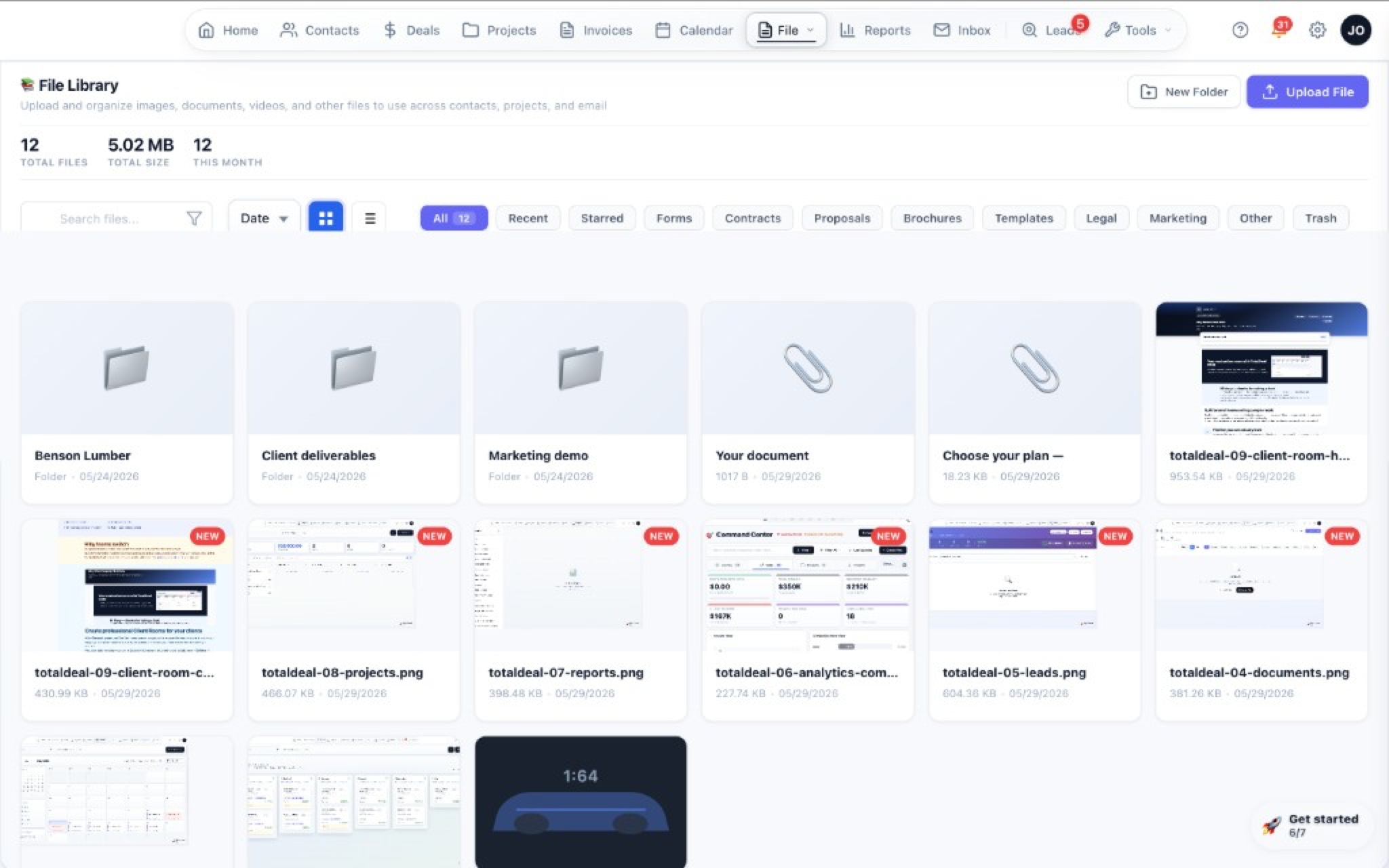 Document library with uploaded files, folders, and previews